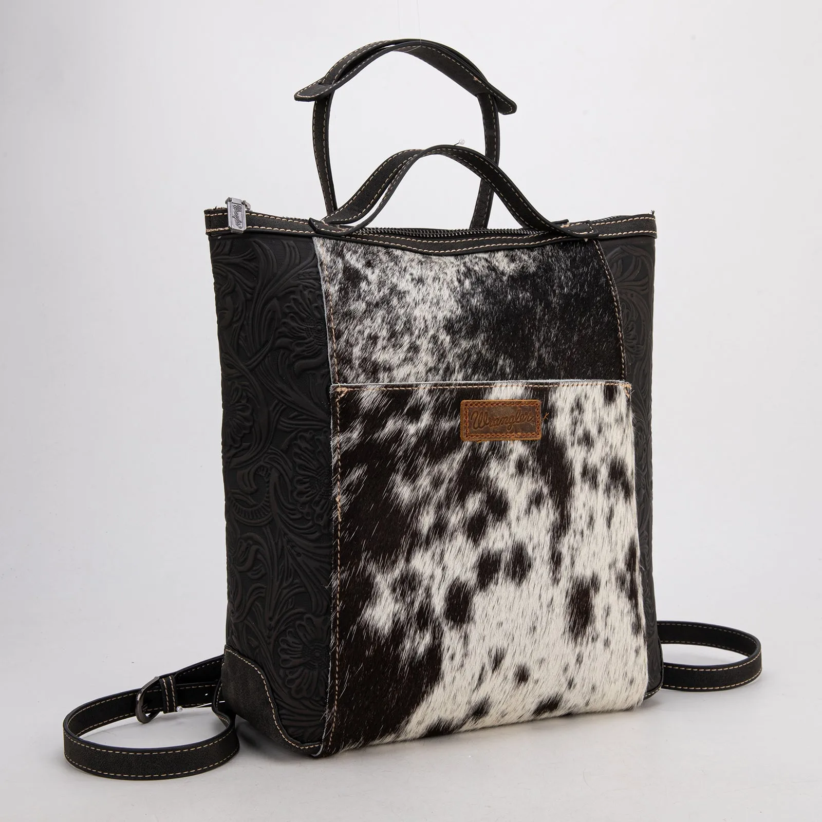 WG169-9112 Wrangler Genuine Hair-On Cowhide Floral Tooled Convertible Backpack/Crossbody - Black)